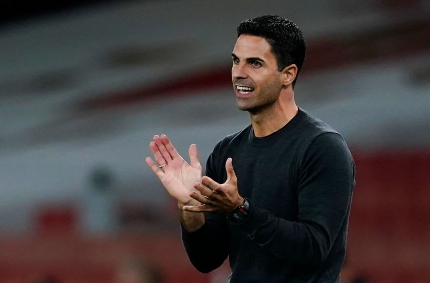 Arsenal's Spanish manager Mikel Arteta reacts on the touchline during the English Premier League football match between Arsenal and West Ham United at the Emirates Stadium in London on September 19, 2020. (Photo by Will Oliver / POOL / AFP) / RESTRICTED TO EDITORIAL USE. No use with unauthorized audio, video, data, fixture lists, club/league logos or 'live' services. Online in-match use limited to 120 images. An additional 40 images may be used in extra time. No video emulation. Social media in-match use limited to 120 images. An additional 40 images may be used in extra time. No use in betting publications, games or single club/league/player publications. / (Photo by WILL OLIVER/POOL/AFP via Getty Images)