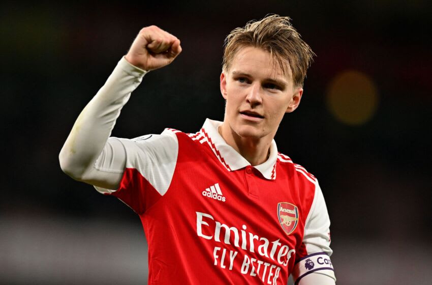 Arsenal's Norwegian midfielder Martin Odegaard celebrates after the English Premier League football match between Arsenal and Everton at the Emirates Stadium in London on March 1, 2023. (Photo by Glyn KIRK / AFP) / RESTRICTED TO EDITORIAL USE. No use with unauthorized audio, video, data, fixture lists, club/league logos or 'live' services. Online in-match use limited to 120 images. An additional 40 images may be used in extra time. No video emulation. Social media in-match use limited to 120 images. An additional 40 images may be used in extra time. No use in betting publications, games or single club/league/player publications. / (Photo by GLYN KIRK/AFP via Getty Images)