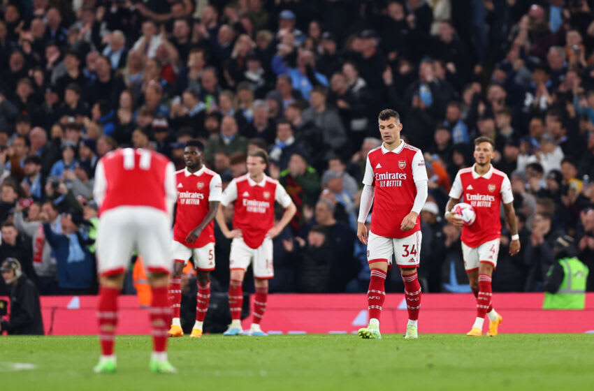 MANCHESTER, ENGLAND - APRIL 26: Dejected Arsenal players after Manchester City scored to make it 3-0 during the Premier League match between Manchester City and Arsenal FC at Etihad Stadium on April 26, 2023 in Manchester, United Kingdom. (Photo by Robbie Jay Barratt - AMA/Getty Images)