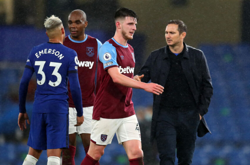 LONDON, ENGLAND - DECEMBER 21: Declan Rice of West Ham United walks past Frank Lampard manager of Chelsea after the Premier League match between Chelsea and West Ham United at Stamford Bridge on December 21, 2020 in London, England. (Photo by Catherine Ivill/Getty Images)
