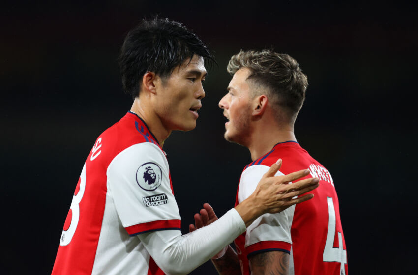 LONDON, ENGLAND - OCTOBER 18: Takehiro Tomiyasu and Ben White of Arsenal during the Premier League match between Arsenal and Crystal Palace at Emirates Stadium on October 18, 2021 in London, England. (Photo by Catherine Ivill/Getty Images)