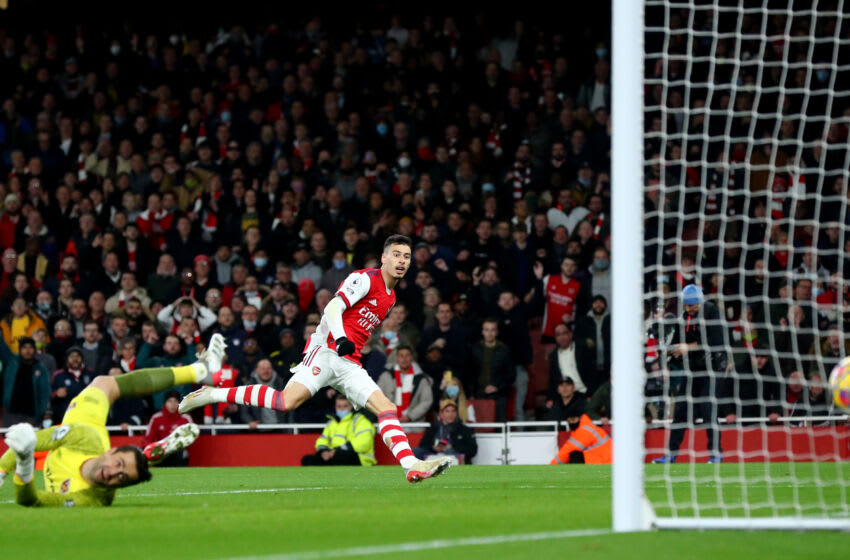 LONDON, ENGLAND - DECEMBER 15: Gabriel Martinelli of Arsenal scores his teams first goal during the Premier League match between Arsenal and West Ham United at Emirates Stadium on December 15, 2021 in London, England. (Photo by Chloe Knott - Danehouse/Getty Images)