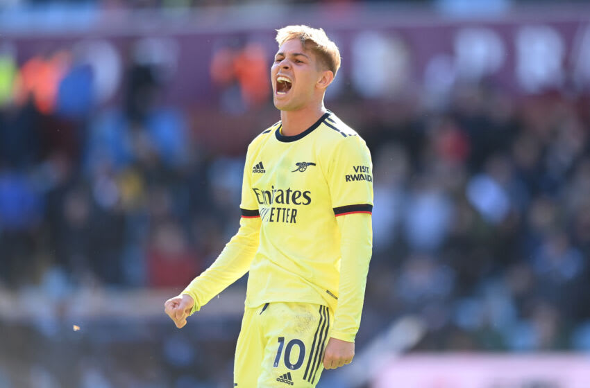 BIRMINGHAM, ENGLAND - MARCH 19: Emile Smith Rowe of Arsenal celebrates with the fans after their sides victory during the Premier League match between Aston Villa and Arsenal at Villa Park on March 19, 2022 in Birmingham, England. (Photo by Michael Regan/Getty Images)