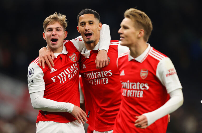LONDON, ENGLAND - JANUARY 15: William Saliba and Emile Smith Rowe celebrate after the Premier League match between Tottenham Hotspur and Arsenal FC at Tottenham Hotspur Stadium on January 15, 2023 in London, England. (Photo by James Gill - Danehouse/Getty Images)