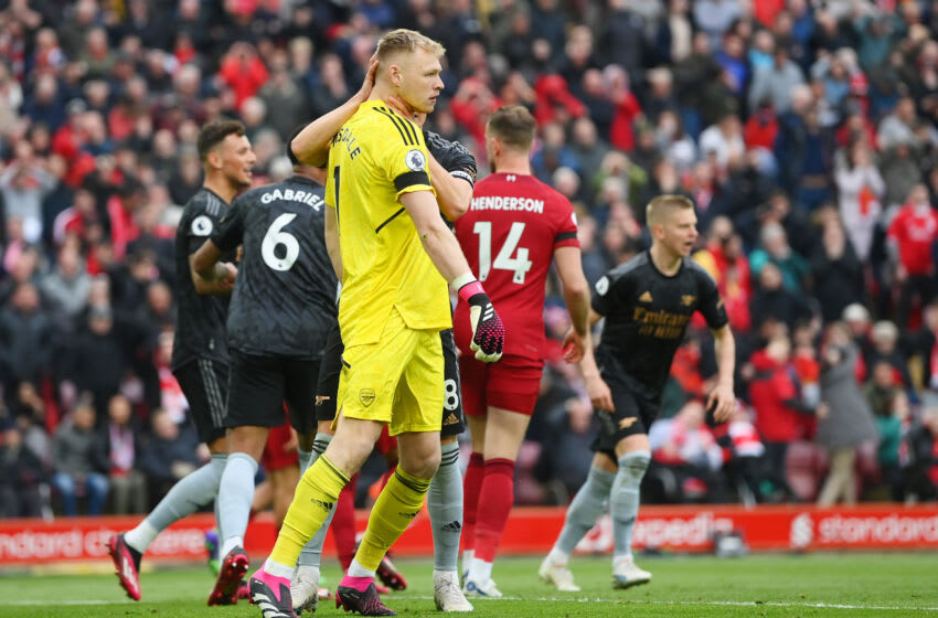 LIVERPOOL, ENGLAND - APRIL 09: Martin Odegaard ( Obscured ) celebrates with Aaron Ramsdale of Arsenal after Mohamed Salah of Liverpool misses their penalty kick during the Premier League match between Liverpool FC and Arsenal FC at Anfield on April 09, 2023 in Liverpool, England. (Photo by Shaun Botterill/Getty Images)