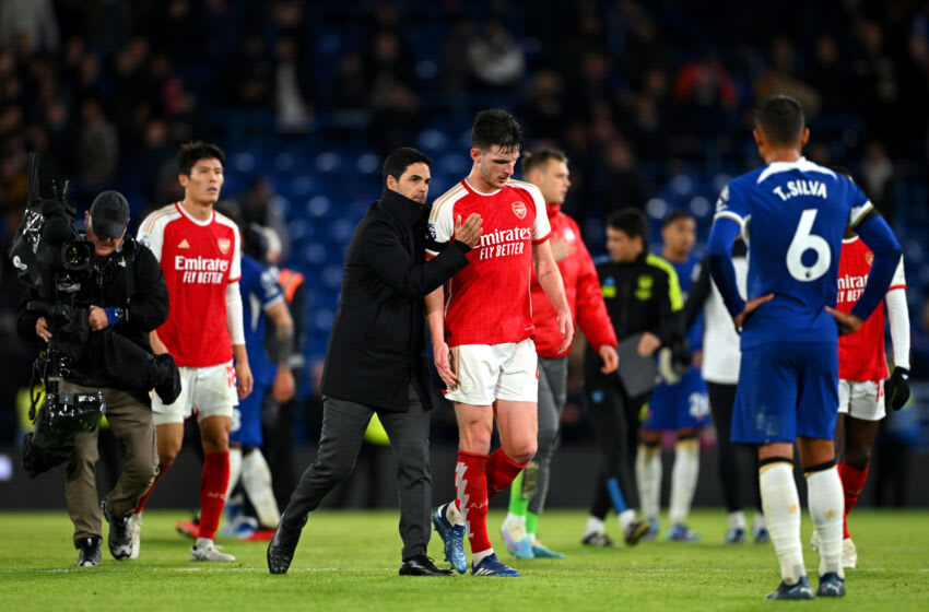 LONDON, ENGLAND - OCTOBER 21: Mikel Arteta, Manager of Arsenal, interacts with Declan Rice of Arsenal following the Premier League match between Chelsea FC and Arsenal FC at Stamford Bridge on October 21, 2023 in London, England. (Photo by Michael Regan/Getty Images)