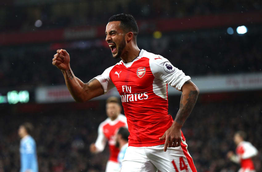 LONDON, ENGLAND - DECEMBER 10: Theo Walcott of Arsenal celebrates scoring his sides first goal during the Premier League match between Arsenal and Stoke City at the Emirates Stadium on December 10, 2016 in London, England. (Photo by Clive Rose/Getty Images)
