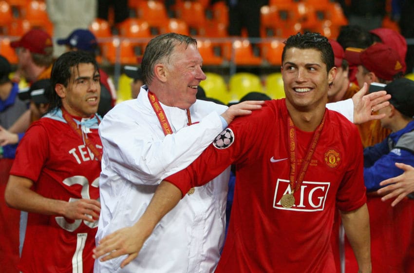MOSCOW - MAY 21: Manchester United manager Sir Alex Ferguson (C) smiles with Cristiano Ronaldo of Manchester United after the UEFA Champions League Final match between Manchester United and Chelsea at the Luzhniki Stadium on May 21, 2008 in Moscow, Russia. (Photo by Alex Livesey/Getty Images)