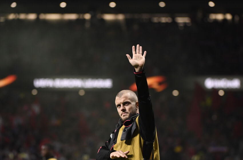 Arsenal's English midfielder Jack Wilshere waves at the end of the UEFA Europa League semi-final second leg football match between Club Atletico de Madrid and Arsenal FC at the Wanda Metropolitano stadium in Madrid on May 3, 2018. (Photo by PIERRE-PHILIPPE MARCOU / AFP) (Photo credit should read PIERRE-PHILIPPE MARCOU/AFP via Getty Images)